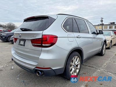 Czwarte zdjęcie samochodu z boku: 2016 BMW X5 SDRIVE35I VIN:5UXKR2C59G0R69371 - miniatura