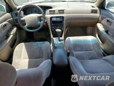 Zdjęcie 8 z 12 samochodu: 1999 TOYOTA CAMRY LE VIN:JT2BG22K8X0285550 - miniatura