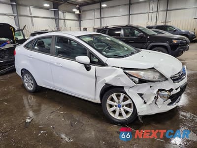 Czwarte zdjęcie samochodu z boku: 2012 FORD FIESTA SE VIN:3FADP4BJ2CM170796 - miniatura