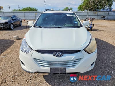 Piąte zdjęcie samochodu w środku: 2012 HYUNDAI TUCSON GLS VIN:KM8JU3AC1CU337658 - miniatura