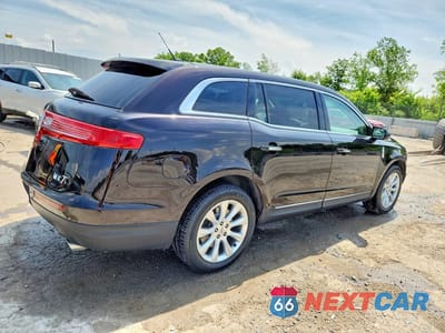 Trzecie zdjęcie samochodu z tyłu: 2014 LINCOLN MKT VIN:2LMHJ5FK6EBL58554 - miniatura