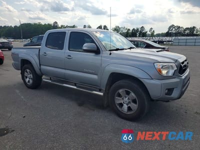 Czwarte zdjęcie samochodu z boku: 2015 TOYOTA TACOMA V6 VIN:3TMLU4EN7FM178586 - miniatura