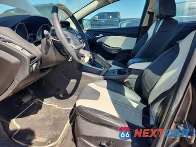 Zdjęcie 7 z 12 samochodu: 2013 FORD FOCUS TITANIUM VIN:1FADP3N24DL106258 - miniatura