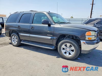 Czwarte zdjęcie samochodu z boku: 2004 GMC YUKON VIN:1GKEC13V44R310507 - miniatura