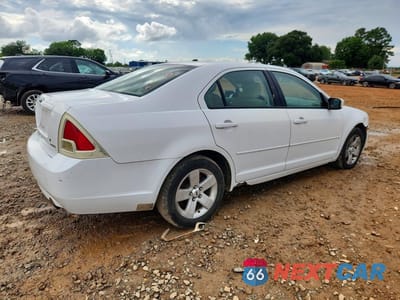 Trzecie zdjęcie samochodu z tyłu: 2006 FORD FUSION SE VIN:3FAFP07196R188875 - miniatura