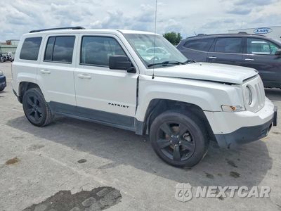 Czwarte zdjęcie samochodu z boku: 2014 JEEP PATRIOT VIN:1C4NJPBAXED813086 - miniatura