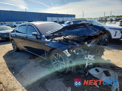 Czwarte zdjęcie samochodu z boku: 2020 BMW 750 XI VIN:WBA7U2C08LCD32877 - miniatura