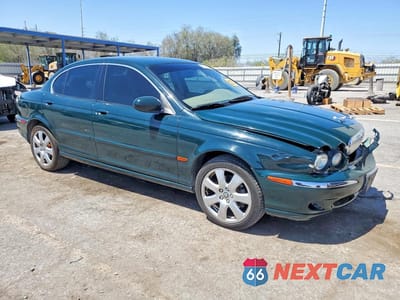 Czwarte zdjęcie samochodu z boku: 2004 JAGUAR X-TYPE 3.0 VIN:SAJEA51C34WE00845 - miniatura