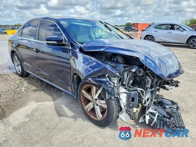 Czwarte zdjęcie samochodu z boku: 2013 VOLKSWAGEN PASSAT SE VIN:1VWBH7A39DC102627 - miniatura