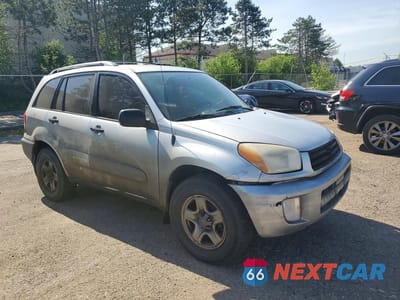 Czwarte zdjęcie samochodu z boku: 2001 TOYOTA RAV4 BASE VIN:JTEHH20V110050180 - miniatura