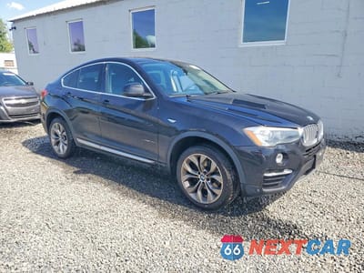 Czwarte zdjęcie samochodu z boku: 2016 BMW X4 XDRIVE35I VIN:5UXXW5C5XG0N92193 - miniatura