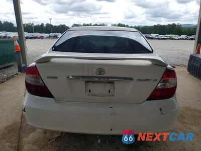 Zdjęcie 6 z 12 samochodu: 2003 TOYOTA CAMRY LE VIN:4T1BE32K13U226566 - miniatura