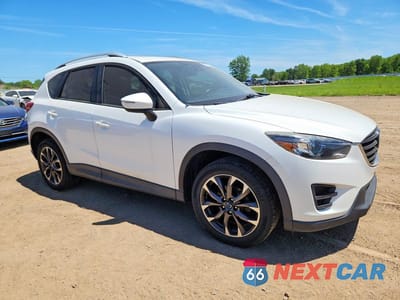 Czwarte zdjęcie samochodu z boku: 2016 MAZDA CX-5 GT VIN:JM3KE4DY2G0878788 - miniatura