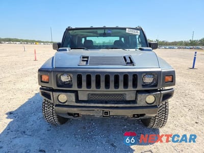 Piąte zdjęcie samochodu w środku: 2005 HUMMER H2 VIN:5GRGN22U15H112244 - miniatura