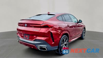 Czwarte zdjęcie samochodu z boku: 2021 BMW X6 M50I VIN:5UXCY8C09M9E51267 - miniatura