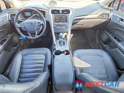 Zdjęcie 8 z 12 samochodu: 2015 FORD FUSION SE HYBRID VIN:3FA6P0LU1FR214160 - miniatura