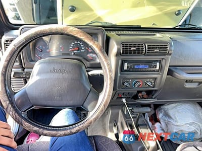 Zdjęcie 9 z 10 samochodu: 2001 JEEP WRANGLER / TJ SE VIN:1J4FA29P01P324149 - miniatura