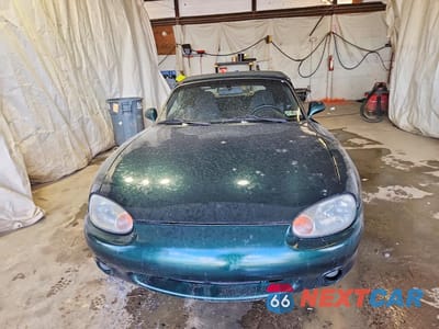 Piąte zdjęcie samochodu w środku: 2000 MAZDA MX-5 MIATA BASE VIN:JM1NB3539Y0140063 - miniatura