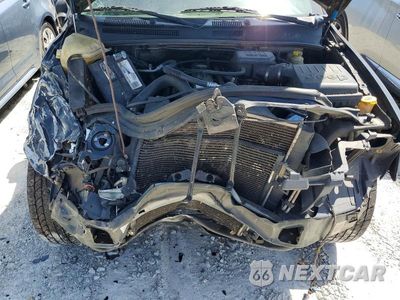 Zdjęcie 11 z 12 samochodu: 2004 JEEP GRAND CHEROKEE LAREDO VIN:1J4GX48S44C328463 - miniatura