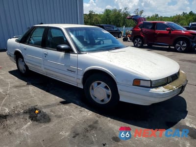 Czwarte zdjęcie samochodu z boku: 1992 OLDSMOBILE CUTLASS SUPREME S VIN:1G3WH54T1ND336907 - miniatura