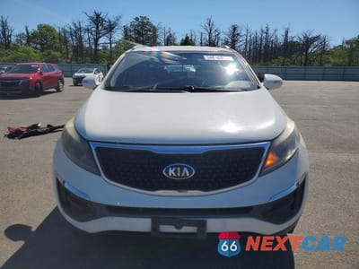 Piąte zdjęcie samochodu w środku: 2015 KIA SPORTAGE LX VIN:KNDPB3AC7F7747579 - miniatura