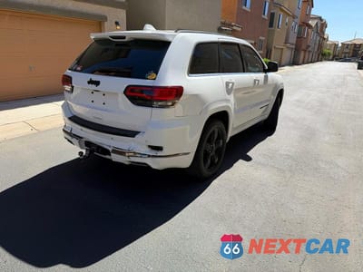 Czwarte zdjęcie samochodu z boku: 2016 JEEP GRAND CHEROKEE OVERLAND VIN:1C4RJFCG3GC338405 - miniatura