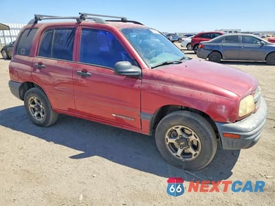 Czwarte zdjęcie samochodu z boku: 1999 CHEV TRACKER VIN:2CNBJ13C9X6912866 - miniatura