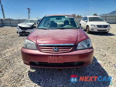 Piąte zdjęcie samochodu w środku: 2002 HONDA CIVIC LX VIN:1HGES16502L023564 - miniatura