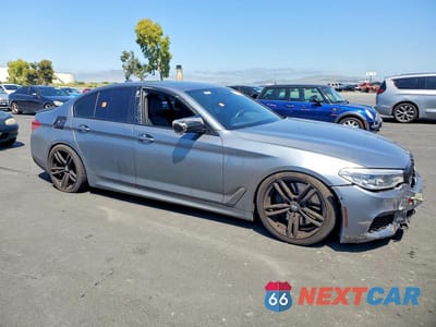 Czwarte zdjęcie samochodu z boku: 2020 BMW M550XI VIN:WBAJS7C02LBN96219 - miniatura