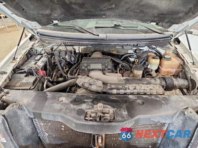 Zdjęcie 11 z 12 samochodu: 2004 FORD F150 VIN:1FTPX12534NB67521 - miniatura