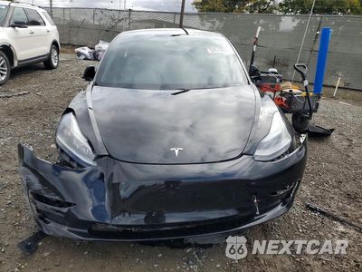 Piąte zdjęcie samochodu w środku: 2021 TESLA MODEL 3 VIN:5YJ3E1EC6MF936221 - miniatura