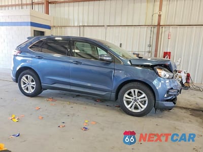 Czwarte zdjęcie samochodu z boku: 2019 FORD EDGE SEL VIN:2FMPK3J97KBC05559 - miniatura