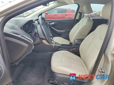 Zdjęcie 7 z 12 samochodu: 2015 FORD FOCUS TITANIUM VIN:1FADP3N21FL268836 - miniatura