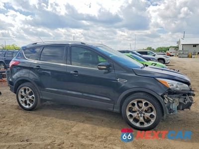 Czwarte zdjęcie samochodu z boku: 2015 FORD ESCAPE TITANIUM VIN:1FMCU9J98FUA52167 - miniatura