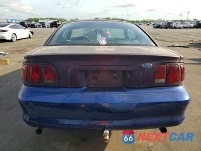 Zdjęcie 6 z 12 samochodu: 1996 FORD MUSTANG VIN:1FALP4042TF170001 - miniatura