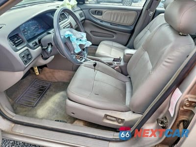Zdjęcie 7 z 13 samochodu: 1999 NISSAN ALTIMA XE VIN:1N4DL01D6XC260718 - miniatura