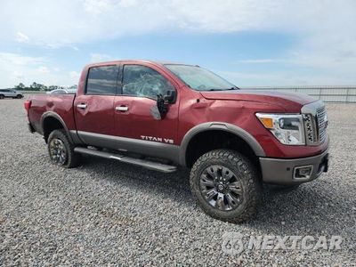 Czwarte zdjęcie samochodu z boku: 2018 NISSAN TITAN PLATINUM RESERVE VIN:1N6AA1E59JN548382 - miniatura