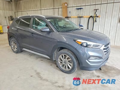 Czwarte zdjęcie samochodu z boku: 2017 HYUNDAI TUCSON SE VIN:KM8J3CA44HU428846 - miniatura