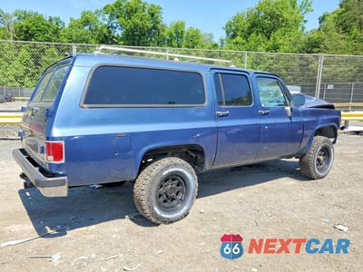 Trzecie zdjęcie samochodu z tyłu: 1991 CHEVROLET SUBURBAN V2500 VIN:1GNGV26K9MF122743 - miniatura