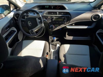 Zdjęcie 8 z 13 samochodu: 2013 TOYOTA PRIUS C TWO VIN:JTDKDTB32D1036102 - miniatura