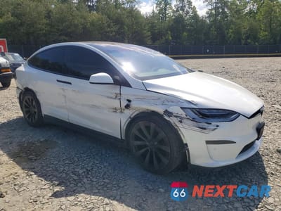 Czwarte zdjęcie samochodu z boku: 2022 TESLA MODEL X VIN:7SAXCBE65NF343588 - miniatura