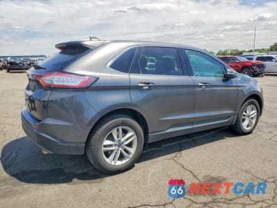 Trzecie zdjęcie samochodu z tyłu: 2016 FORD EDGE SEL VIN:2FMPK4J93GBC10657 - miniatura