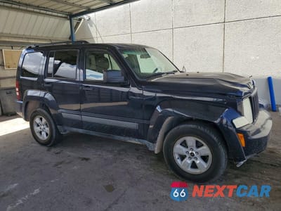 Czwarte zdjęcie samochodu z boku: 2011 JEEP LIBERTY SPORT VIN:1J4PN2GK7BW545643 - miniatura