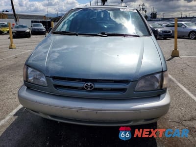 Piąte zdjęcie samochodu w środku: 1999 TOYOTA SIENNA XLE VIN:4T3ZF13C9XU120905 - miniatura