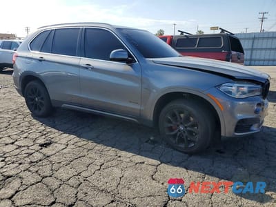 Czwarte zdjęcie samochodu z boku: 2014 BMW X5 SDRIVE35I VIN:5UXKR2C57E0C00447 - miniatura