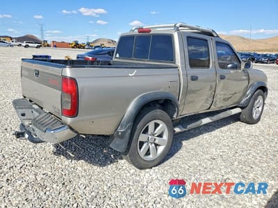Trzecie zdjęcie samochodu z tyłu: 2000 NISSAN FRONTIER 4WD SE CREW VIN:1N6ED27T6YC423372 - miniatura