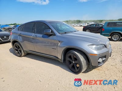 Czwarte zdjęcie samochodu z boku: 2010 BMW X6 XDRIVE50I VIN:5UXFG8C57ALZ94544 - miniatura