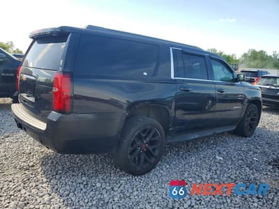 Trzecie zdjęcie samochodu z tyłu: 2019 CHEVROLET SUBURBAN K1500 LT VIN:1GNSKHKC6KR143937 - miniatura