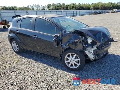 Czwarte zdjęcie samochodu z boku: 2012 TOYOTA PRIUS C THREE VIN:JTDKDTB39C1511517 - miniatura