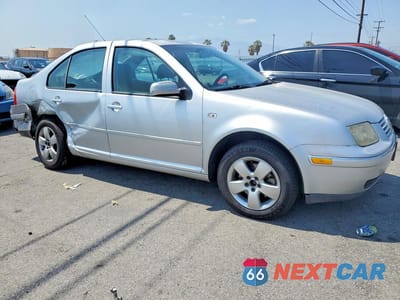 Czwarte zdjęcie samochodu z boku: 2004 VOLKSWAGEN JETTA S VIN:3VWSA69M94M093082 - miniatura